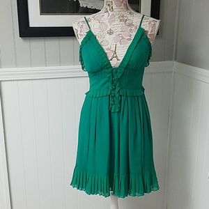 Dora Landa green dress